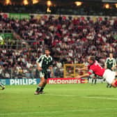 England striker Alan Shearer pictured heading the ball into Germany's net at Euro 2000. (Pic: Getty)