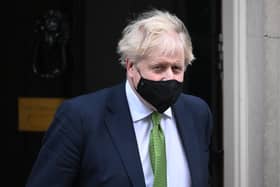 Prime Minister Boris Johnson was facing calls to resign at PMQs. 