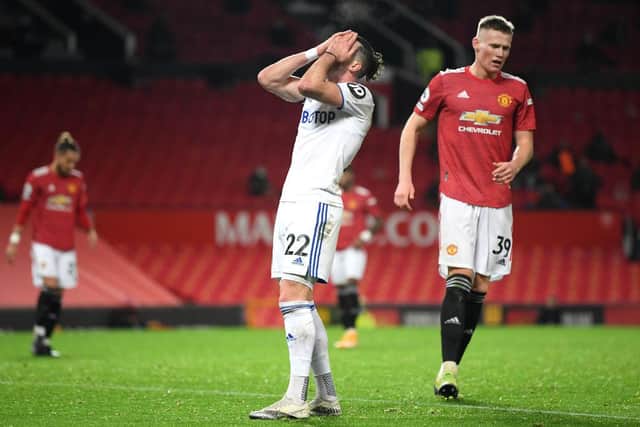 Jack Harrison of Leeds United reacts during the 6-2 defeat against Manchester United at Old Trafford.