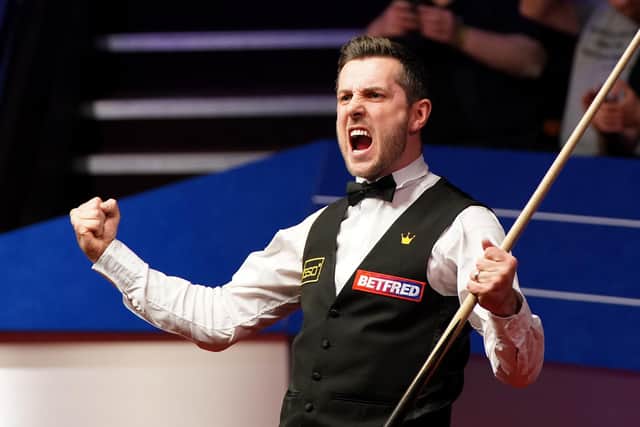 England's Mark Selby celebrates after beating Shaun Murphy at the Betfred World Snooker Championships 2021 at The Crucible.