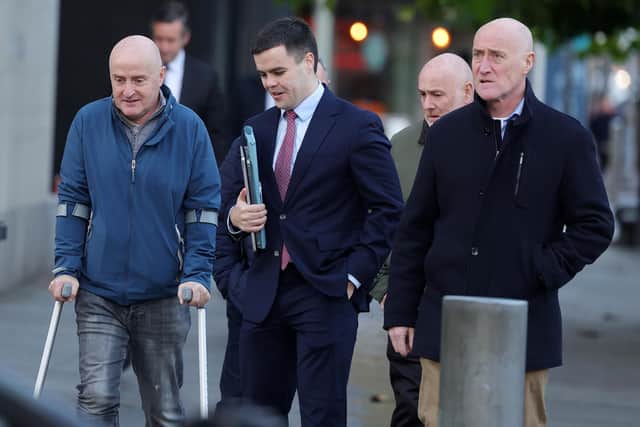 The family of Sean Farmer attend the High Court in Belfast with Diarmuid Brecknell from Phoniex Law. Picture: Jonathan Porter/PressEye