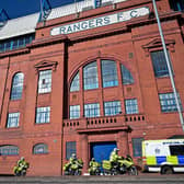 Police on duty outside Ibrox Stadium following the Old Firm derby in March 2021, a match that was at risk of cancellation after Rangers fans breached lockdown to celebrate their team's title win (Photo by Jeff J Mitchell/Getty Images)
