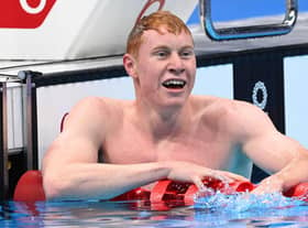 Britain's Tom Dean reacts after winning the final of the men's 200m freestyle swimming event during the Tokyo 2020 Olympic Games at the Tokyo Aquatics Centre in Tokyo on July 27, 2021. (Photo by Attila KISBENEDEK / AFP) (Photo by ATTILA KISBENEDEK/AFP via Getty Images)