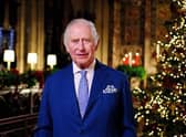 King Charles III is seen during the recording of his first Christmas broadcast in the Quire of St George's Chapel at Windsor Castle, on December 13, 2022 in Windsor, England. (Photo by Victoria Jones - Pool/Getty Images)