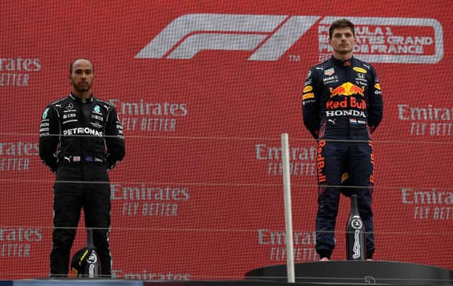 Max Verstappen and Lewis Hamilton. (Photo by Nicolas Tucat - Pool/Getty Images)