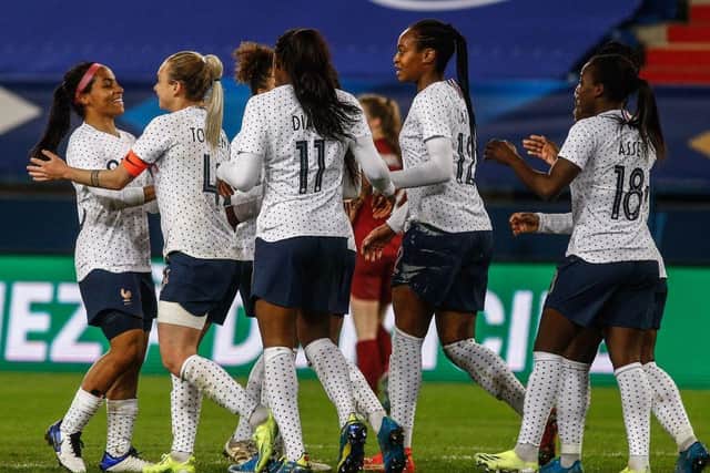 France celebrate after scoring a goal during the friendly against England in Caen.