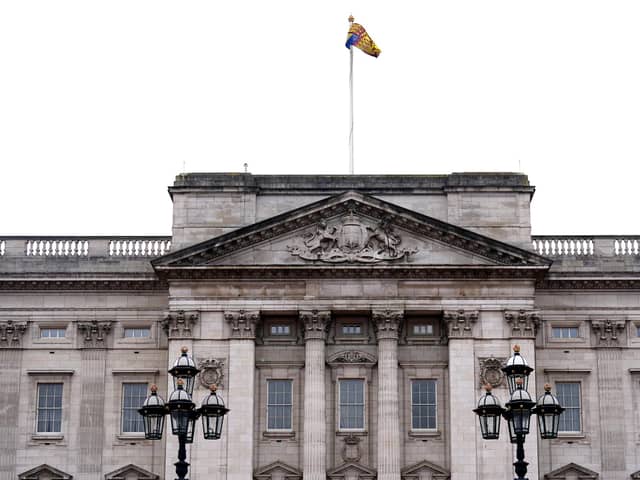 The Royal Standard flies at full mast over Buckingham Palace in London Picture: James Manning/PA Wire