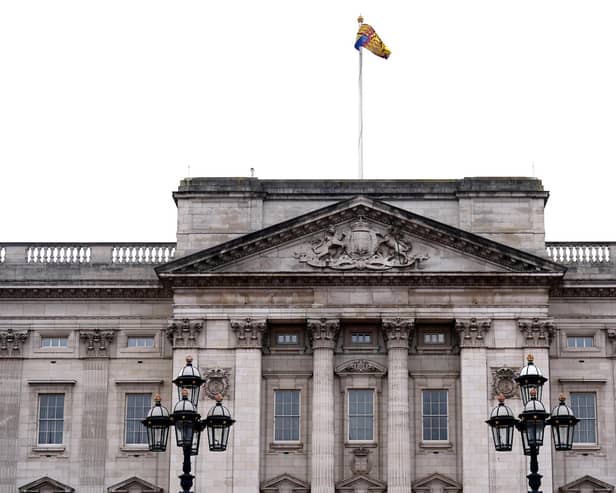 The Royal Standard flies at full mast over Buckingham Palace in London Picture: James Manning/PA Wire