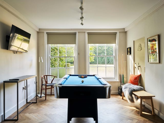 The manor has 10 bedrooms, nine bathrooms, and spectacular grounds complete with tennis court, hot tub, swimming pool, and croquet lawn.