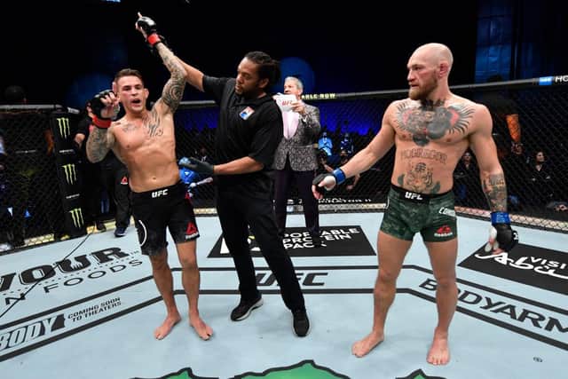 Dustin Poirier reacts after his knockout victory over Conor McGregor of Ireland in a lightweight fight during the UFC 257 event.