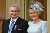 Eamonn Holmes, with his wife Ruth Langsford, after being awarded an OBE for services to broadcasting. (Picture: John Stillwell - WPA Pool/Getty Images)
