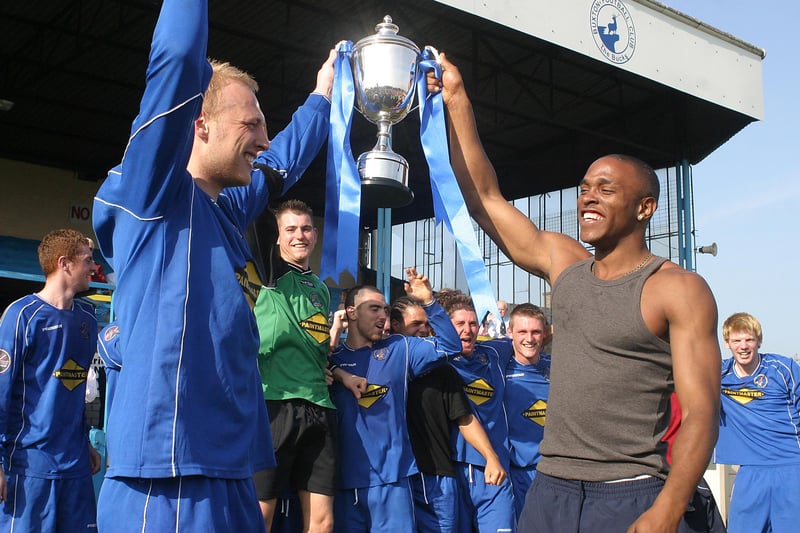 Captain Terry Bowker and Anton Foster lift the Unibond Division One trophy in 2007.