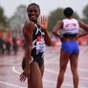 Britain's Dina Asher-Smith celebrates after winning the women's 100m final during the Diamond League athletics meeting at Gateshead International Stadium.