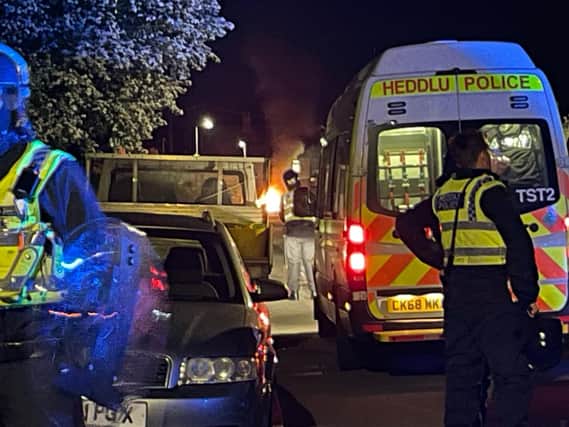Police officers on Howell Road in Cardiff (Photo: Bronwen Weatherby/PA Wire)