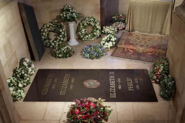 An inscribed stone slab marking the death of Queen Elizabeth II has been laid in the Windsor Castle chapel where her coffin was interred: ROYAL COLLECTION TRUST/AFP via Getty Images