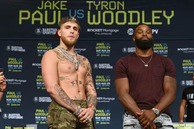 Jake Paul and Tyron Woodley posing during a press conference prior to their fight (Photo: Jason Miller/Getty Images)