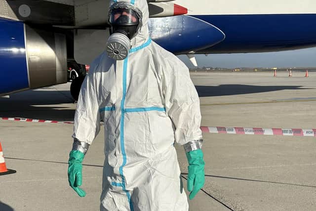 Watch: Hazmat suit swarm grounded British Airways plane after