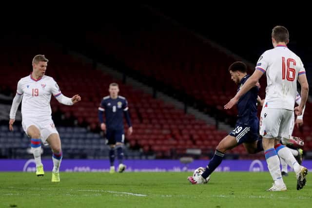 Che Adams rolls the ball home for his first goal for Scotland against Faroe Islands at Hampden Park.