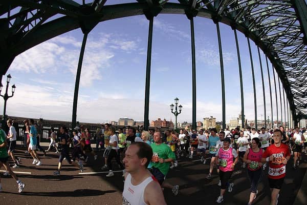 Runners cross the Tyne Bridge during the Great North Run.  (Photo by Ian Walton/Getty Images)