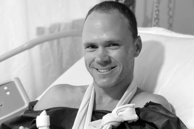 Chris Froome posted a picture of himself in hospital after a knife accident.