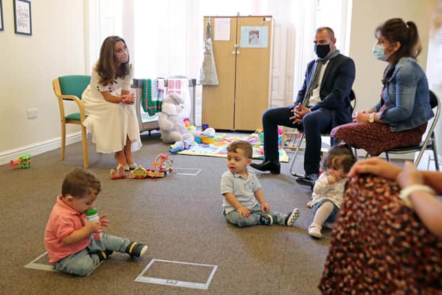 The Duchess of Cambridge talked with Ali Wartty, Sahara Hamawandy and their triplets San, Shan and Laveen, who received support from Baby Basics, during her visit to Sheffield on August 4, 2020. (Photo by Chris Jackson/POOL /AFP).
