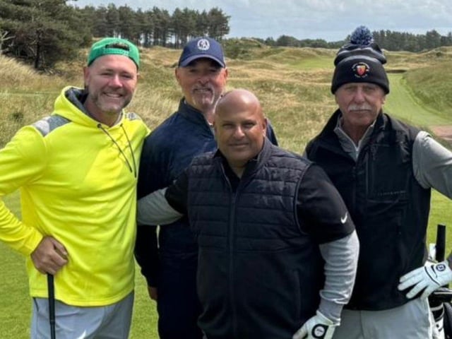 Feisal Nahaboo (centre front) with Mark James, right, and Westlife star Brian McFadden, left, and goalkeeper Bruce Grobbelaar, back.