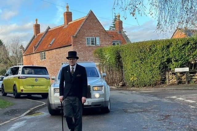 Andrew Brown working as a funeral director