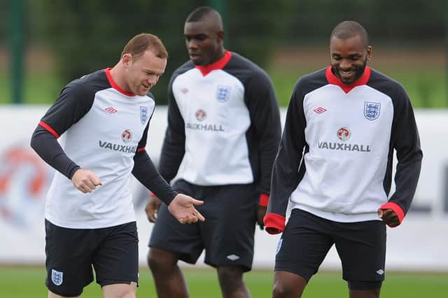 Wayne Rooney and Darren Bent warm up during the England training session ahead of their UEFA EURO 2012 Group G qualifier against Montenegro