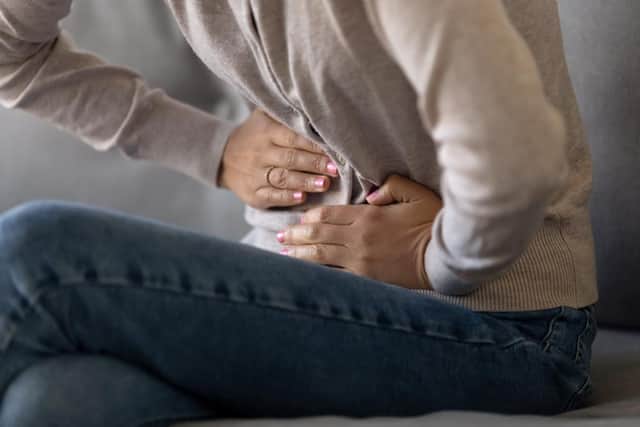One of the main symptoms of bowel cancer is persistent lower abdominal pain (Photo: Shutterstock)