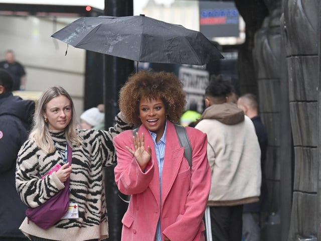 Strictly cast arrive at the Blackpool Tower  in the heavy rain