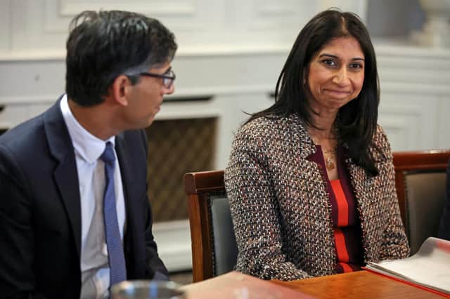 Prime Minister Rishi Sunak and former Home Secretary Suella Braverman. The smiles and shared table have been replaced by bitter animosity. PIC: Phil Noble/PA Wire