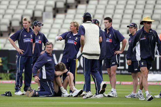 Glenn McGrath buries his head after hurting himself in training before day one of the second npower Ashes Test match between England and Australia at Edgbaston on August 4, 2005.