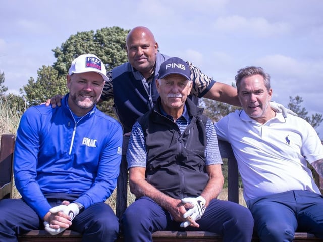 Mark James (centre) flanked by Westlife star Brian McFadden, left, and Jason McAteer, right. Founder Feisal Nahaboo standing.