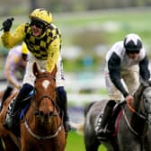 Jockey Paul Townend (left) celebrates on State Man after winning the Unibet Champion Hurdle Challenge Trophy on day one of the 2024 Cheltenham Festival at Cheltenham Racecourse. Picture: Mike Egerton/PA Wire
