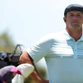 Bryson DeChambeau and a member of his team walk right behind Brooks Koepka with the sound of shoe spikes and muttering clearly picked up by the microphone. (Pic: Getty)