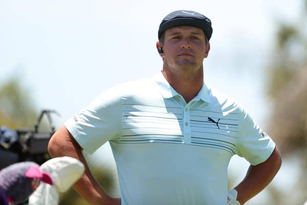 Bryson DeChambeau and a member of his team walk right behind Brooks Koepka with the sound of shoe spikes and muttering clearly picked up by the microphone. (Pic: Getty)