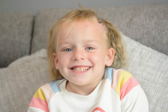 Emily Hill, 5, who was knocked down by an electric motorbike near Bradford, West Yorks (SWNS)