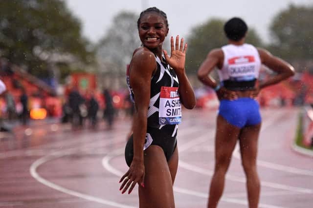 Britain's Dina Asher-Smith celebrates after winning the women's 100m final during the Diamond League athletics meeting at Gateshead International Stadium in Gateshead, north-east England on May 23, 2021. (Photo by Oli SCARFF / AFP) (Photo by OLI SCARFF/AFP via Getty Images)