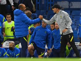 Tottenham Hotspur's head coach Nuno Espirito Santo shakes hands with Chelsea's German head coach Thomas Tuchel (R) after the pre-season friendly.