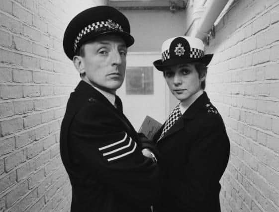 Actors Eric Richard as 'Sergeant Bob Cryer' and Trudie Goodwin as 'Sergeant June Ackland' in British police procedural television series The Bill in 1984.