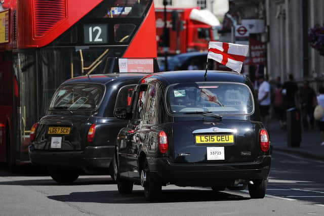 The flag of England, or the Cross of St George, was seen on black cabs in central London in 2018, prior to the Russia 2018 World Cup (AFP via Getty Images)