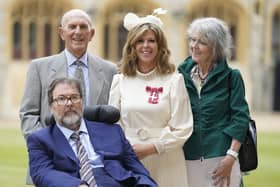 Kate Garraway, with her husband Derek Draper and her parents Gordon and Marilyn Garraway, after being made a Member of the Order of the British Empire for her services to broadcasting, journalism and charity by the Prince of Wales during an investiture ceremony at Windsor Castle, Berkshire in June 2023.
