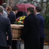 Pall bearers carry the casket at the funeral of TV presenter and journalist Nick Sheridan, at St Ibar's Church in Castlebridge, Co Wexford. (Picture: Brian Lawless/PA Wire)