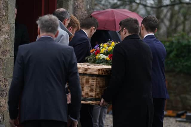 Pall bearers carry the casket at the funeral of TV presenter and journalist Nick Sheridan, at St Ibar's Church in Castlebridge, Co Wexford. (Picture: Brian Lawless/PA Wire)