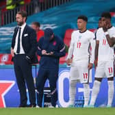 Jadon Sancho and Marcus Rashford of England wait to be substituted  (Photo by Laurence Griffiths/Getty Images)