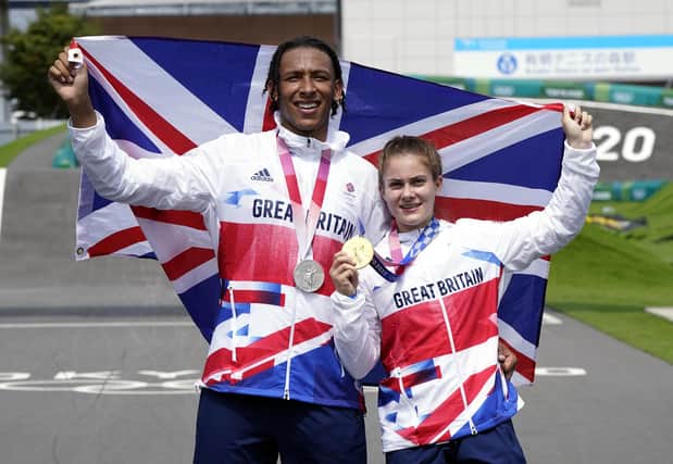 Great Britain's Bethany Shriever and Kye Whyte celebrate their gold and silver medals respectively for the Cycling BMX Racing on the seventh day of the Tokyo 2020 Olympic Games (PA)