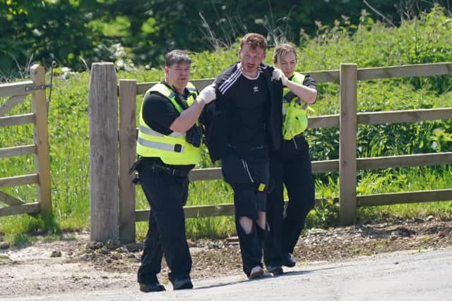 Man, 29, arrested on suspicion of murder after woman and child found ...