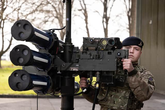 A Gunner from 170 Battery, 12 Regiment Royal Artillery stands with the High Velocity Missile (HVM) Lightweight Multiple Launcher (LML) during a demonstration held at Baker Barracks on Thorney Island. Picture: UK MOD © Crown