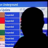 A man looks at an electronic display at Temple Underground Station showing the names of some of the lines closed due to a 2007 Tube strike (Photo: Peter Macdiarmid/Getty Images)
