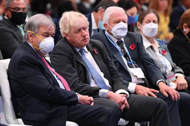Secretary-General of the United Nations António Guterres, Prime Minister Boris Johnson and Sir David Attenborough attend the opening ceremony of the UN Climate Change Conference COP26 at SECC on November 1, 2021 in Glasgow. Photo by Jeff J Mitchell/Getty Images.